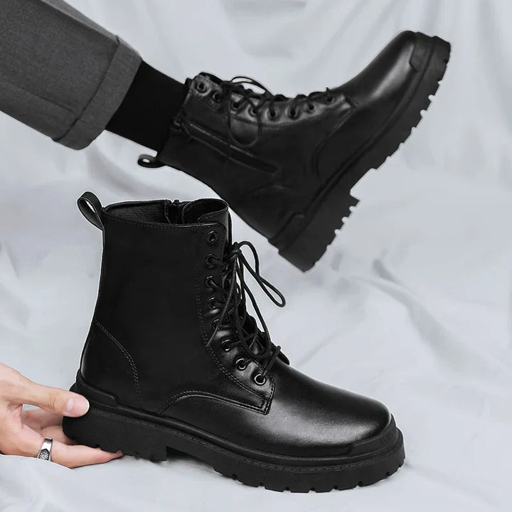 Rugged men's tactical combat boots, black leather, featuring sturdy laces, side zip closure, and ankle support.