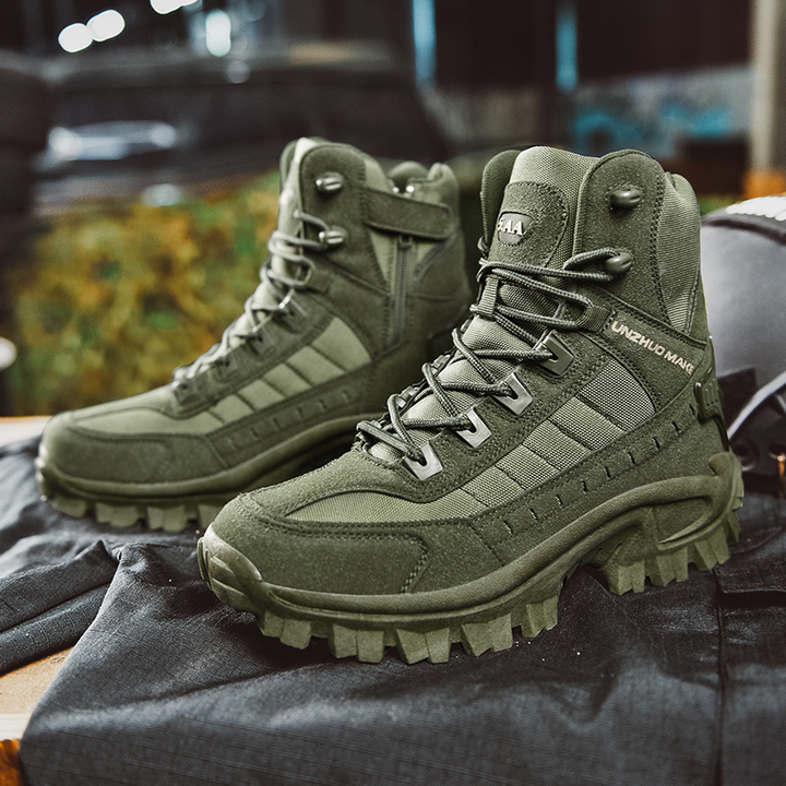 Brown tactical men's work boots, waterproof & durable, ideal for harsh outdoor environments.