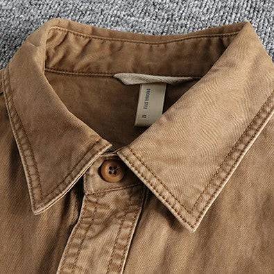 Rugged men's utility field shirt with practical chest pockets, ideal for workwear and versatile outdoor use.