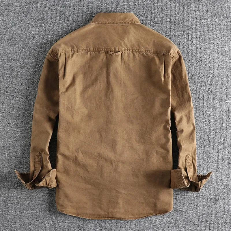 Stylish men's collared field shirt in coal, offering durable comfort for rugged casual wear and outerwear.