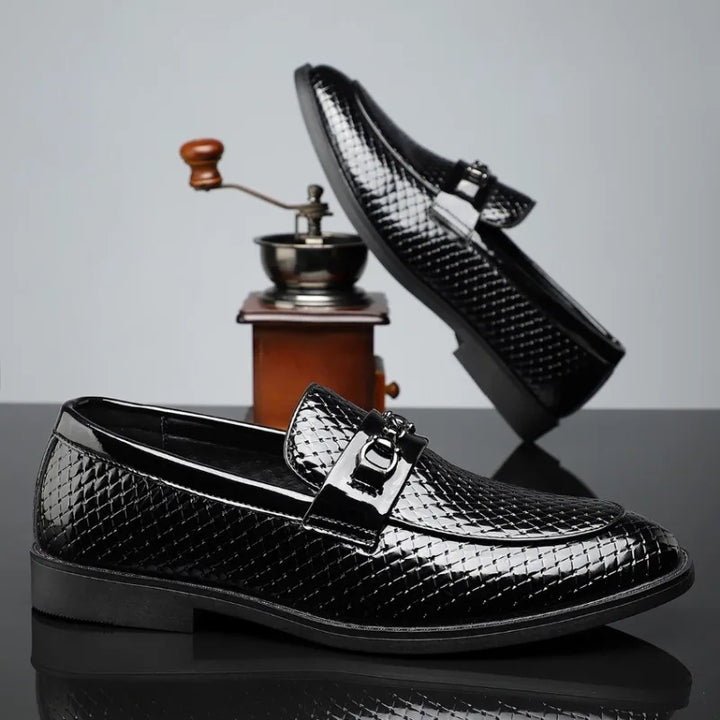 Men's comfortable slip-on embossed leather loafers, designed for easy wear and sophisticated style.