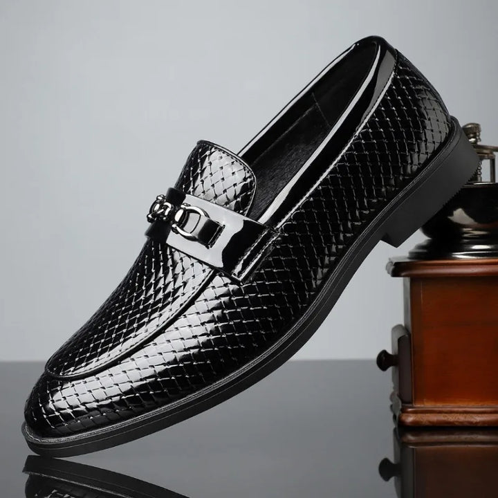 Collection of men's embossed leather bit loafers in various classic colors for versatile styling.