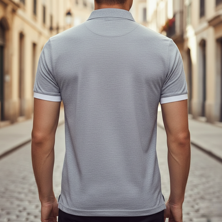 Close-up of a men's collared polo shirt, showcasing the soft fabric and neat button placket detail.