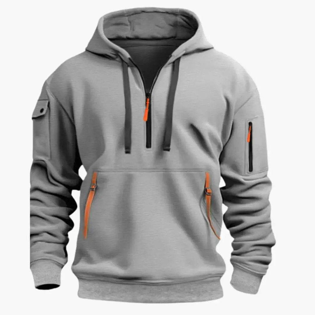 Comfortable men's pullover hoodie with an adjustable hood & secure zipped pockets for active or casual days.