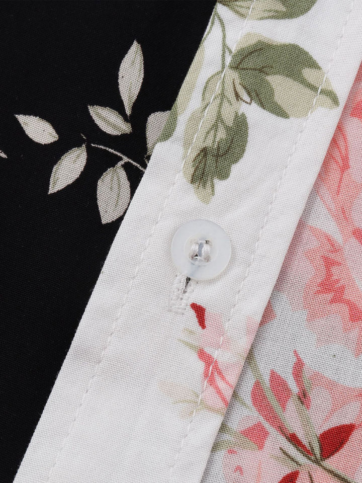 Men's vacation shirt: tropical floral print, short sleeve button-down, perfect for beach.
