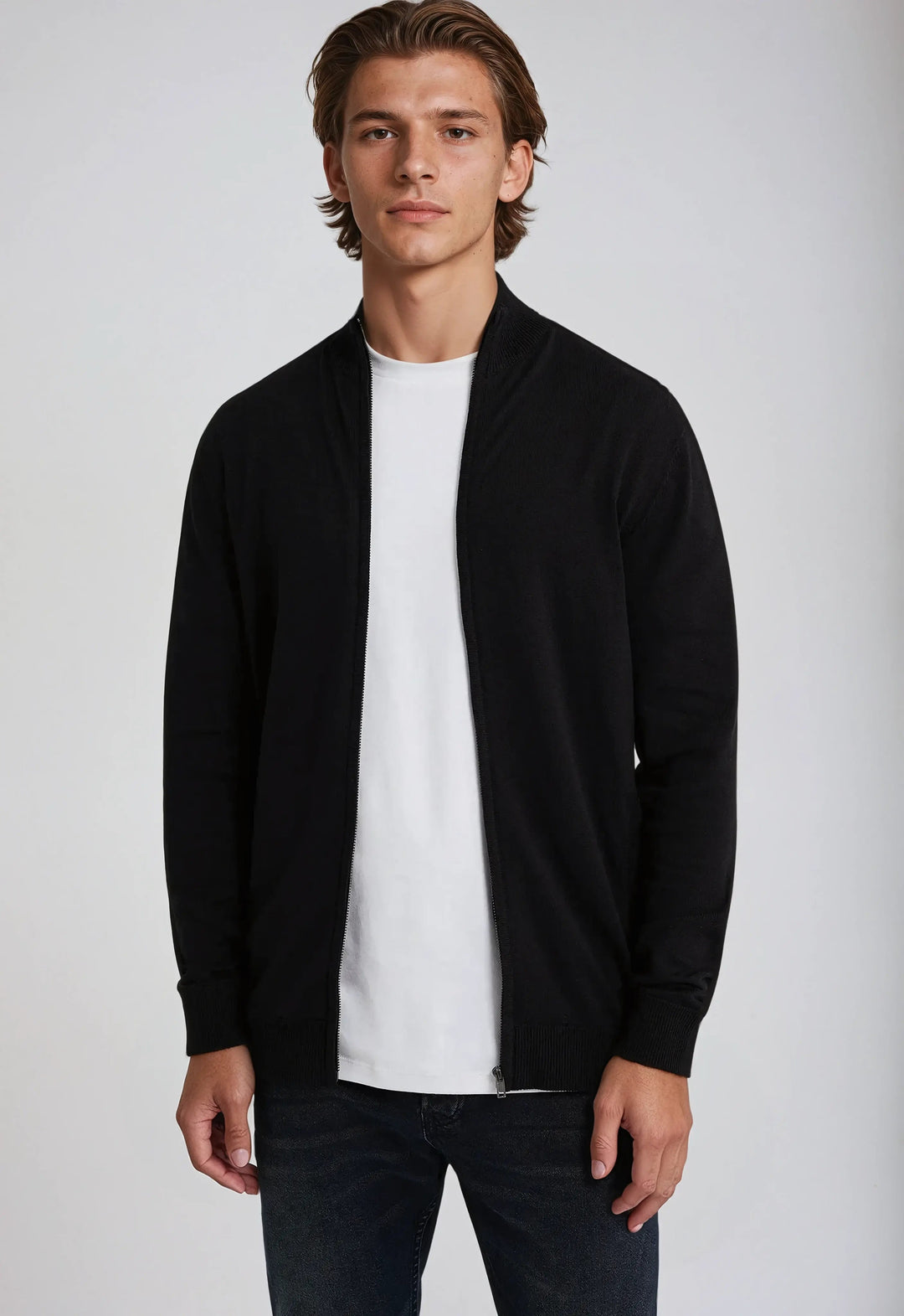 Close-up of a men's full zip knit sweater with a high neck, showcasing texture for fall fashion.
