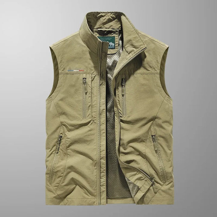 Versatile men's full zip vest. Stylish layering piece for outdoor adventures, casual outings, hiking, and active wear.