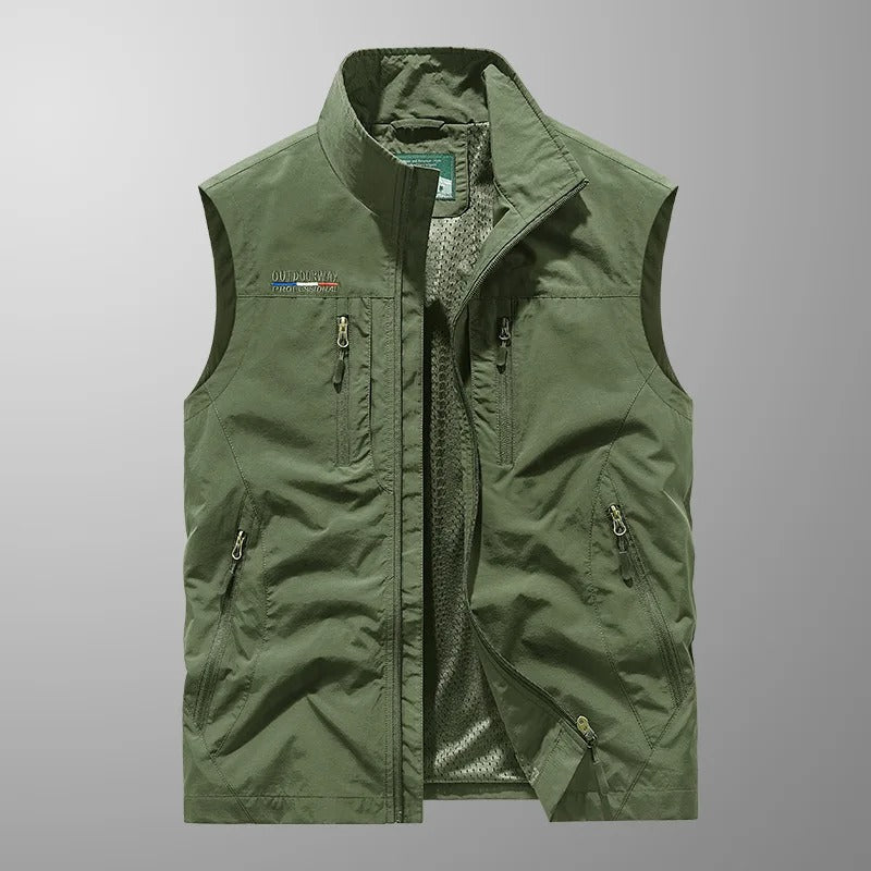 Men's performance full zip outdoor vest. Offers warmth, agility, and comfort for active men in cool weather adventures.