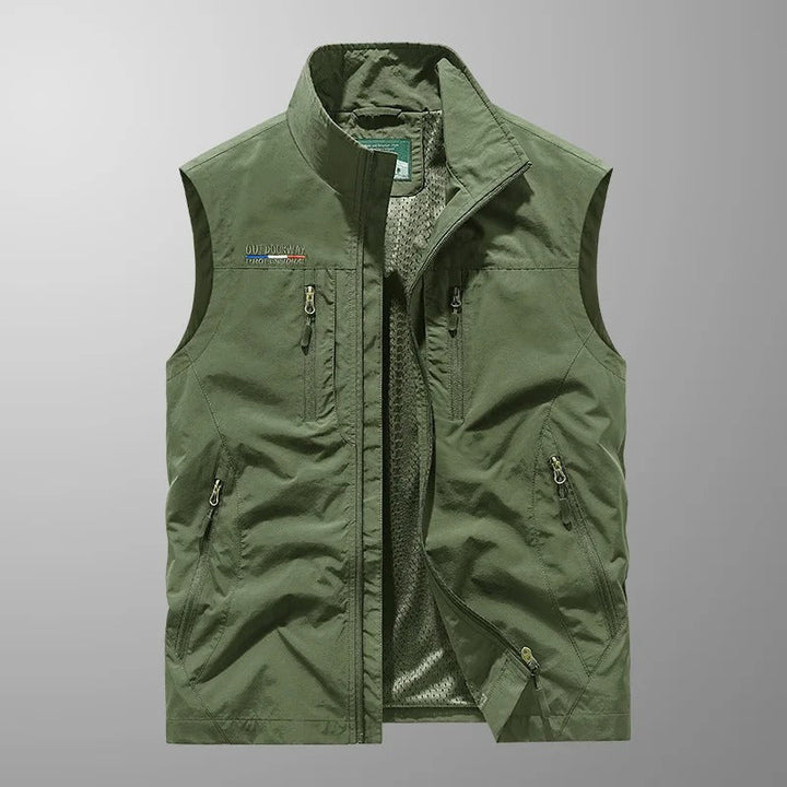 Men's performance full zip outdoor vest. Offers warmth, agility, and comfort for active men in cool weather adventures.