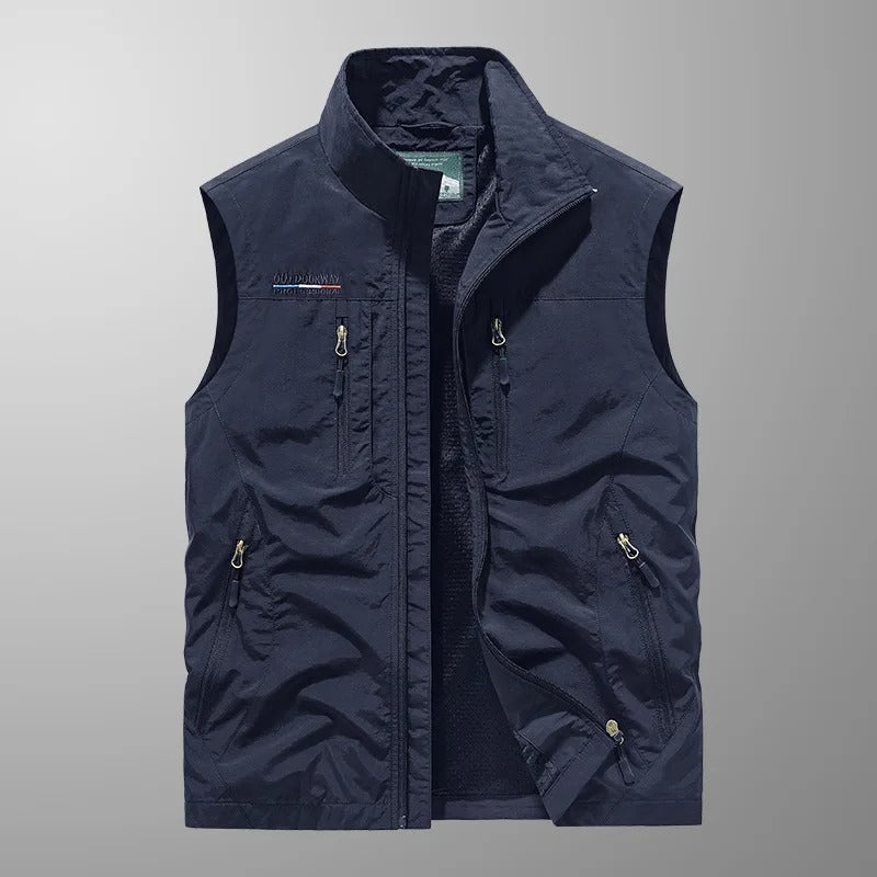 Men's full zip sleeveless outdoor vest. Great for active wear, hiking, and layering during adventures. Stay agile & warm.