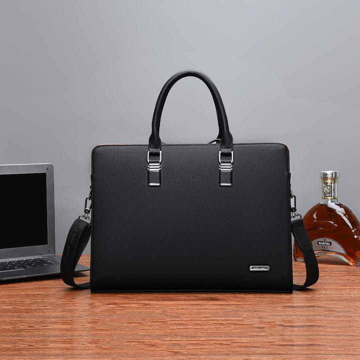 Durable men's leather business travel bag, multi-compartment design.