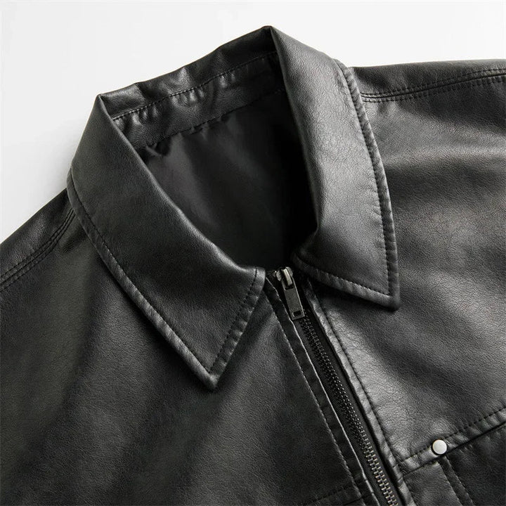 Complete look of a men's casual short-sleeve genuine leather button-up shirt in a rich coffee hue.