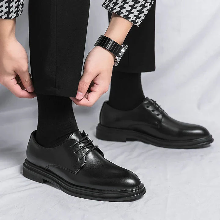Shiny black patent finish men's Derby dress shoes, offering a sophisticated look for any formal or evening outfit.