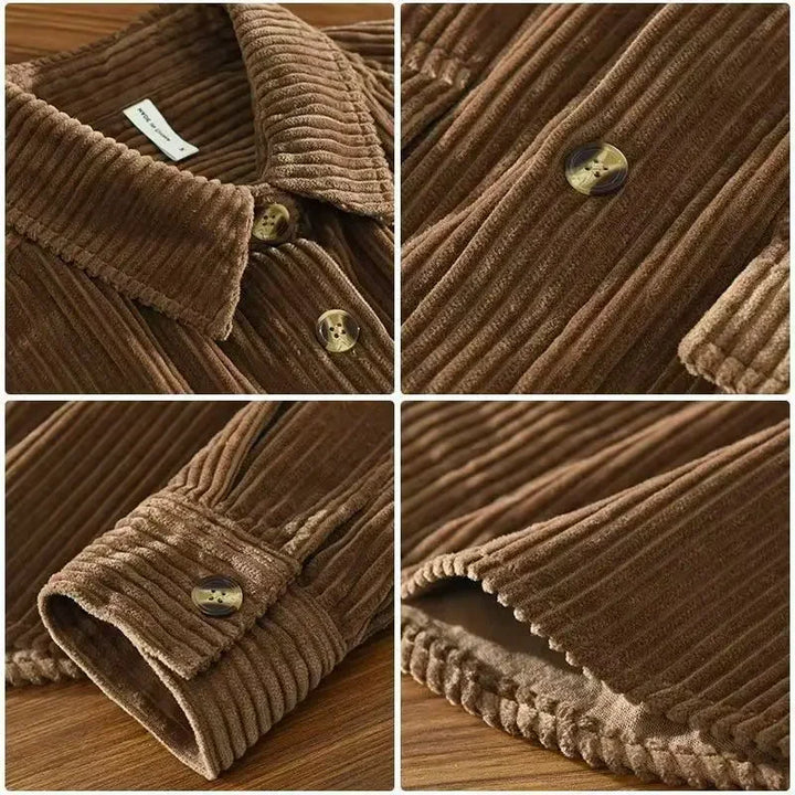 Detail of buttons and stitching on a men's black ribbed corduroy overshirt, menswear