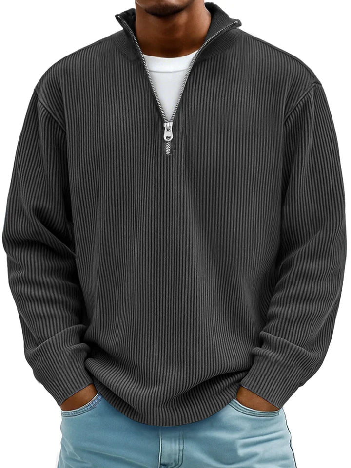 Versatile men's half-zip ribbed sweater in a timeless design. Perfect for layering or casual wear.