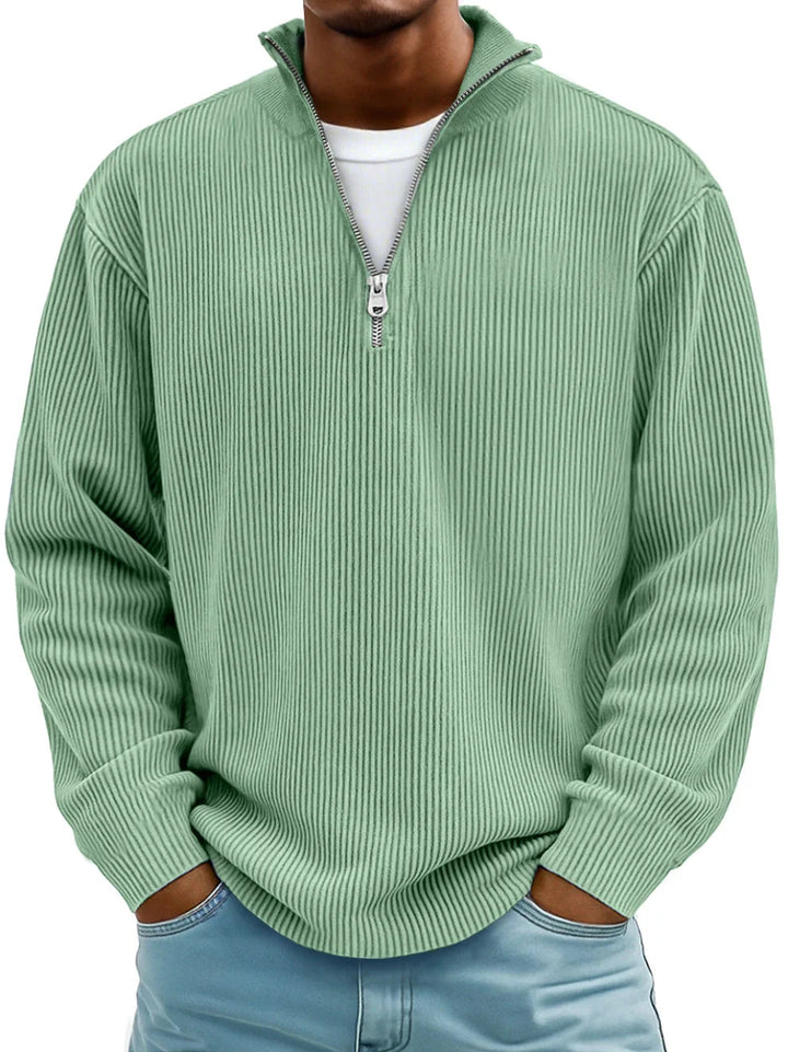 Modern men's ribbed half-zip pullover. Comfortable, versatile, and essential for cooler seasons.