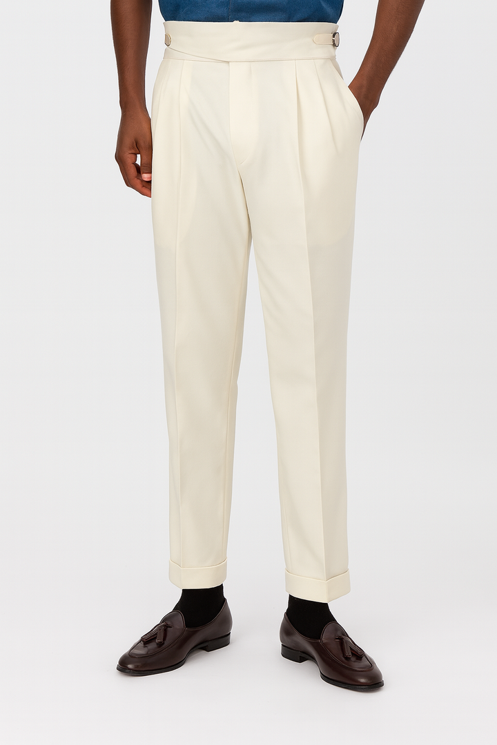 Men's high-waisted pleated trousers, ideal for business casual or elegant formal wear. Tailored fit.