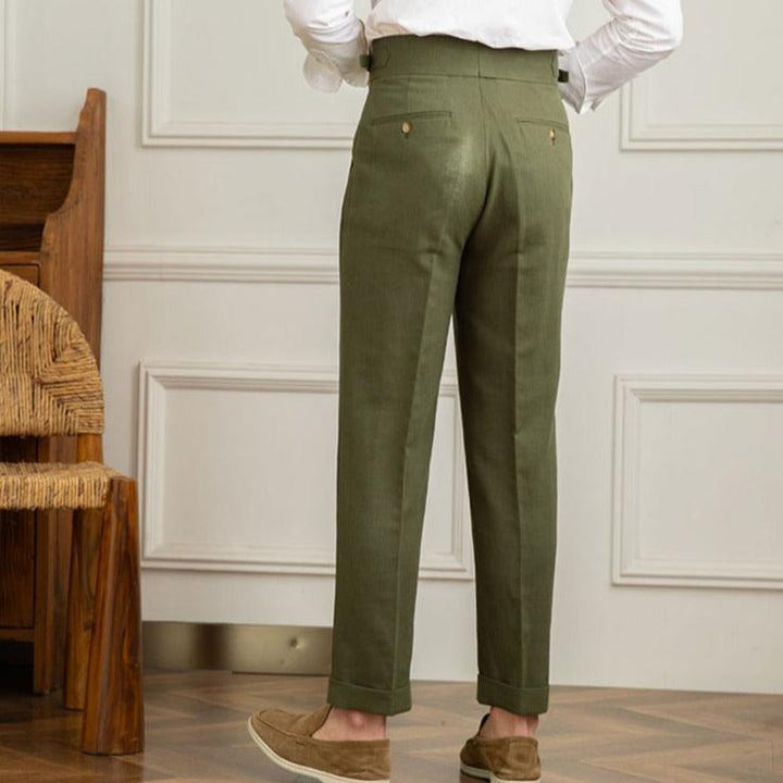 Professional men's high-waisted pleated dress pants, essential for a refined formal or smart casual wardrobe.