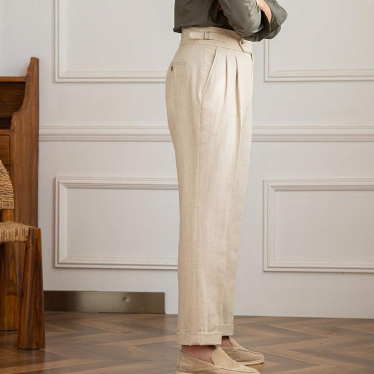 High-waisted men's dress pants with adjustable waistband, perfect for a tailored formal fit.