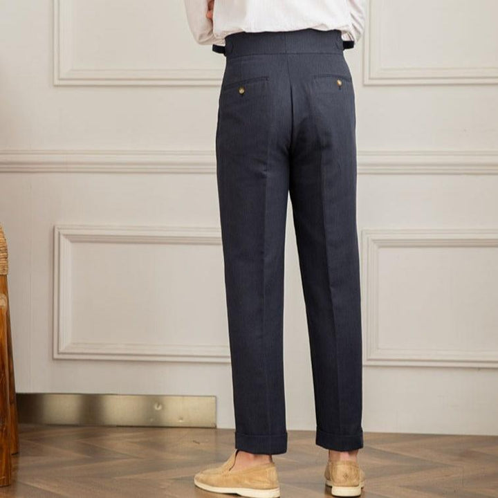 Comfortable men's high-waisted pleated dress pants, blending formal elegance with ease of wear.