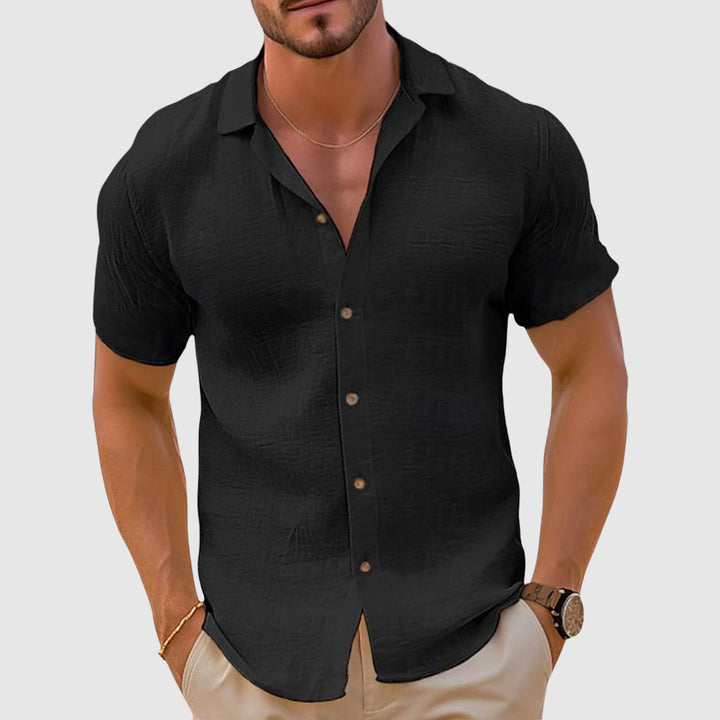 Breathable men's linen short sleeve button down shirt in khaki, ideal for warm weather.