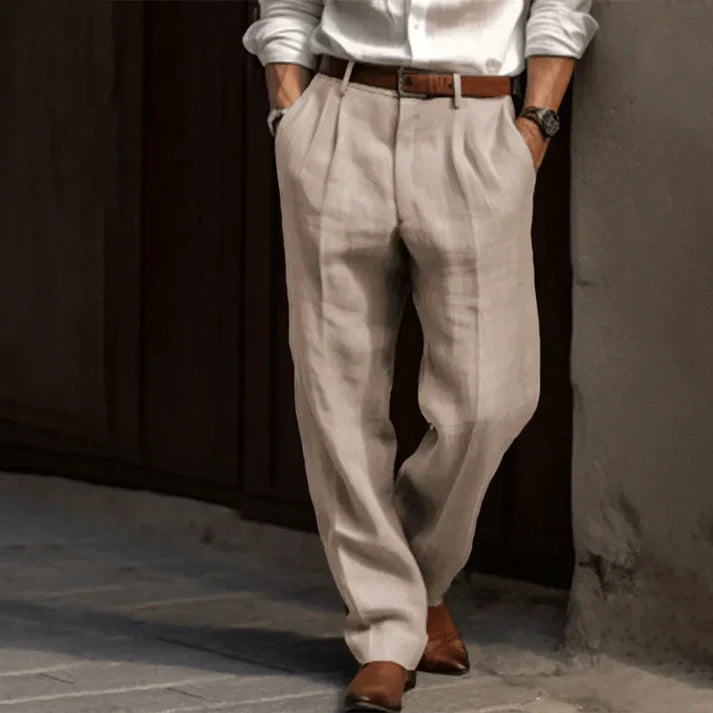 White men's elegant double-pleated summer trousers, lightweight & relaxed fit, suitable for smart casual warm weather wear.
