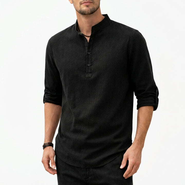 Breathable men's lightweight grandad collar shirt. Comfortable button-up for warm weather.