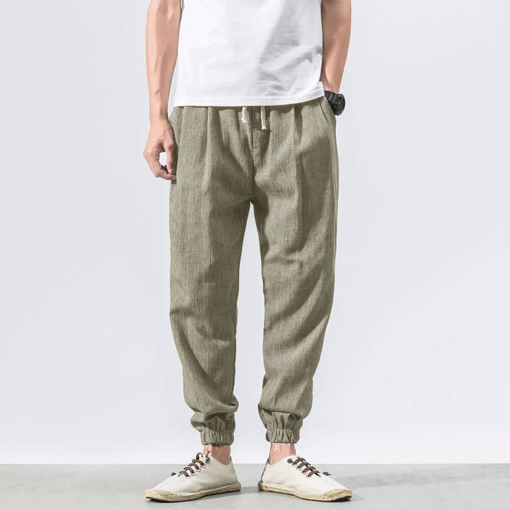 Lightweight men's pants, designed as joggers with a drawstring for summer ease.