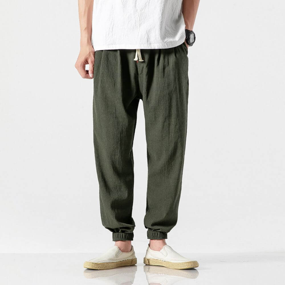 Men's casual drawstring jogger pants, breathable fabric for warm weather.