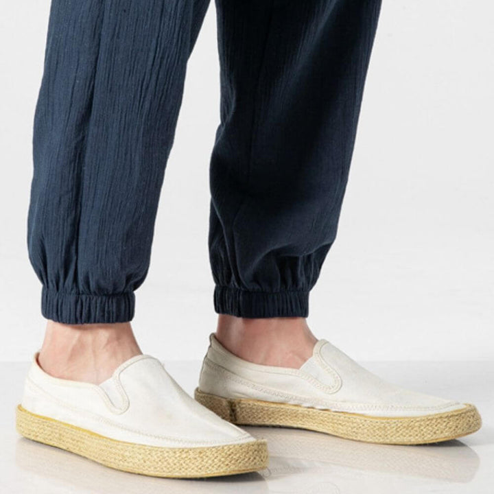 Relaxed fit summer pants for men, ideal for casual everyday wear in warm weather.