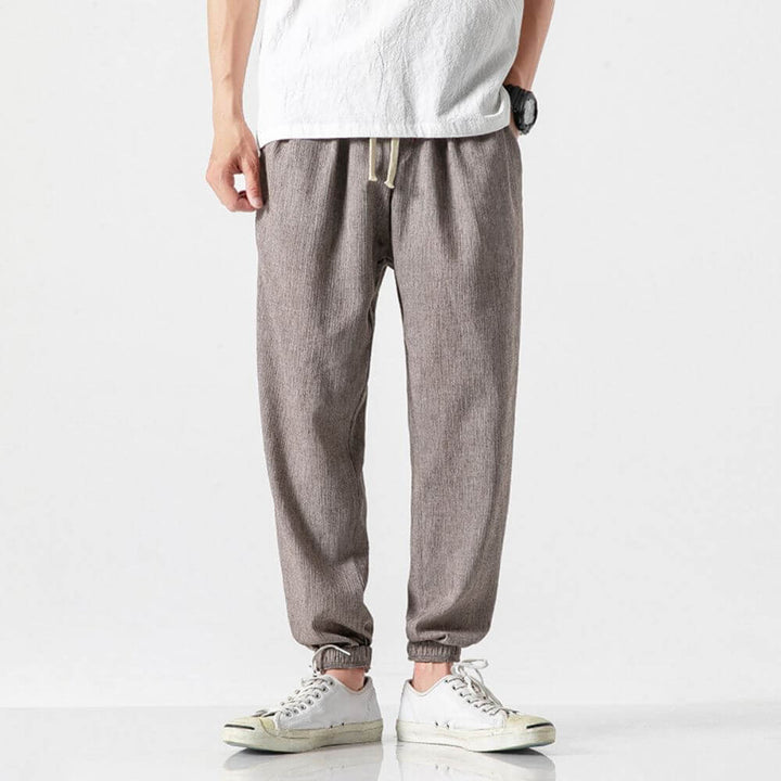 Breathable men's lightweight summer pants, perfect for active casual wear.