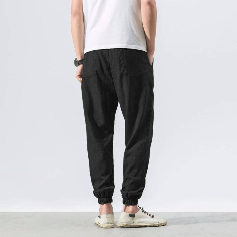 Men's casual jogger pants with adjustable drawstring, great for warm weather.