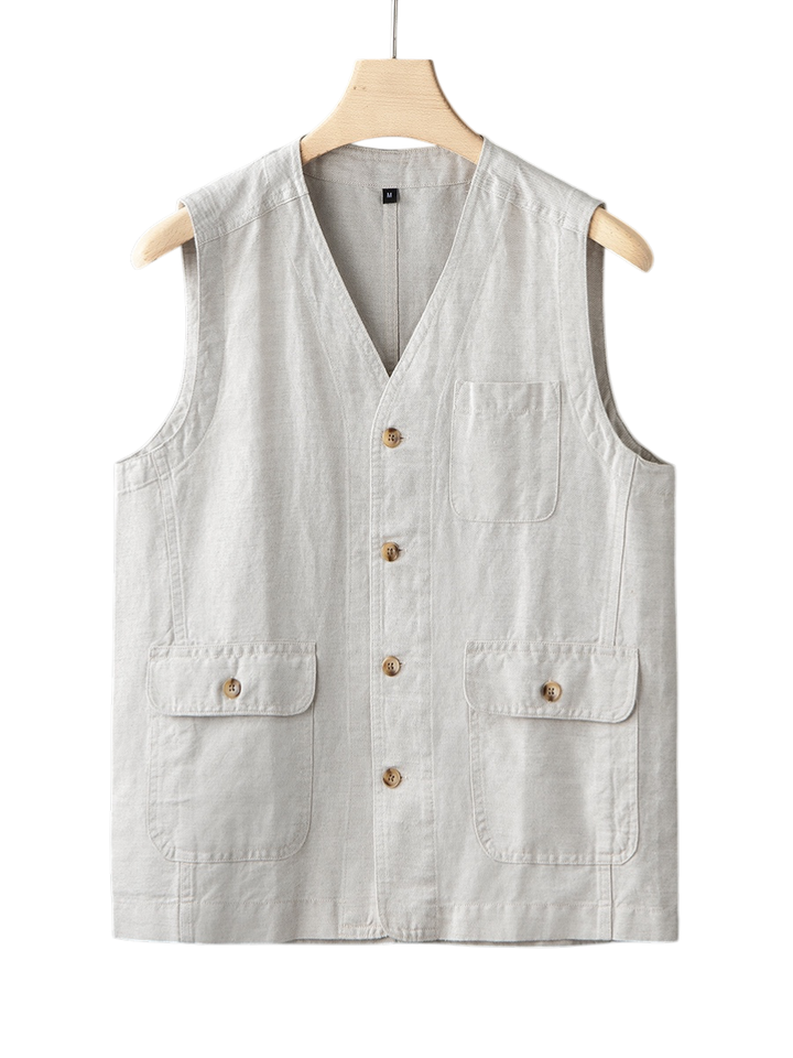 Tailored men's linen vest in a modern style, ideal for smart casual summer outfits. Sleeveless and chic.