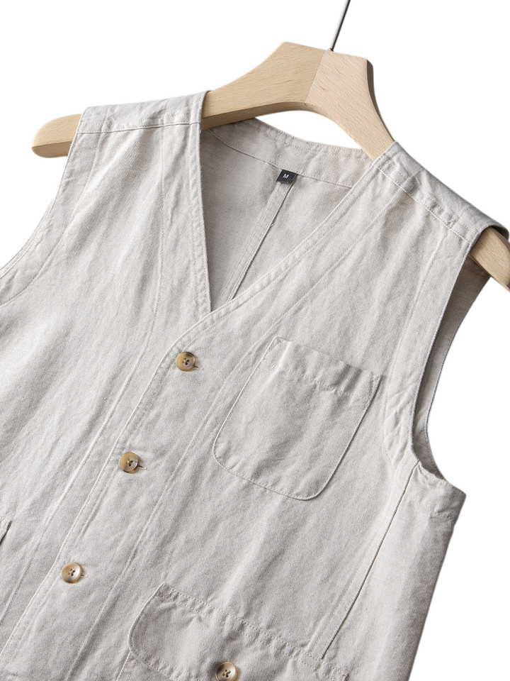 Men's tailored linen vest for smart casual summer outfits. Lightweight and breathable, a modern layering piece.