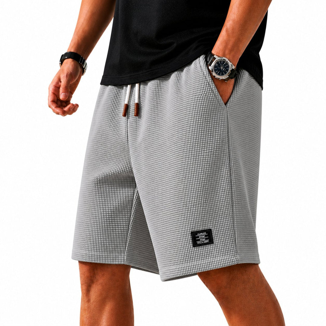 Soft, lightweight men's summer shorts with drawstring, great for casual wear & ultimate comfort.