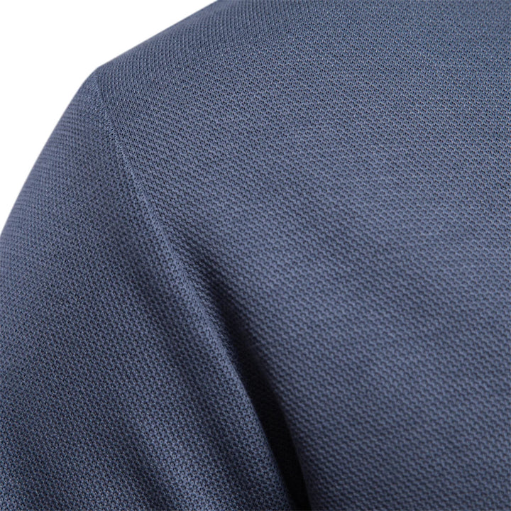 Stylish men's long-sleeve polo shirt featuring a turn-down collar, ideal for a refined casual look.