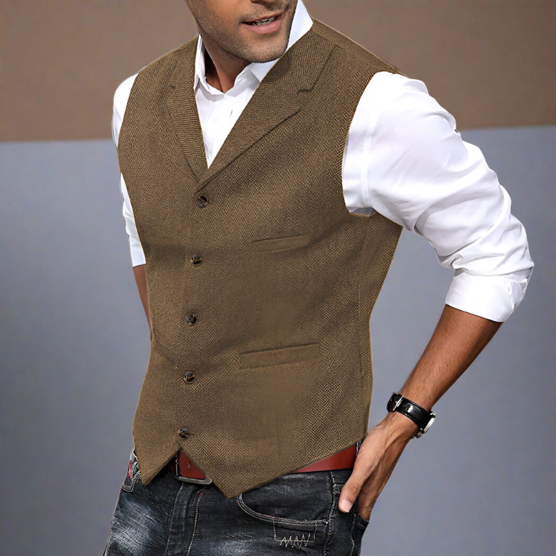 Close-up of sophisticated men's longline V-neck suit vest, highlighting the tailored fabric.