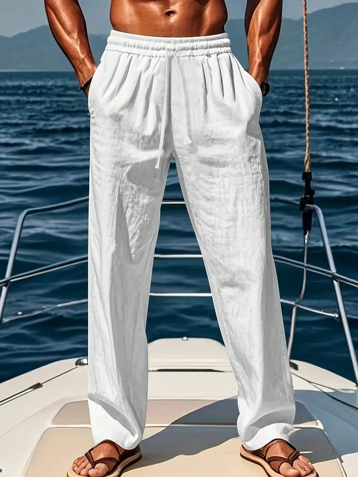Men's loose fit chino pants with drawstring waist in a casual, relaxed style for ultimate everyday comfort.
