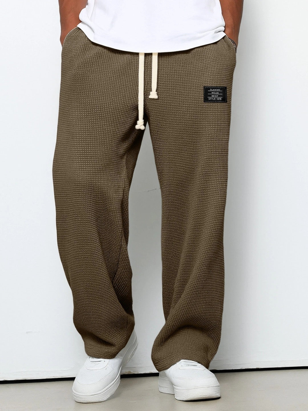Ultra-comfortable men's drawstring pants, loose fit, perfect for all-day wear.