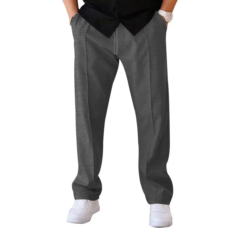 Seamless men's loose-fit formal trousers for a streamlined and polished professional appearance.