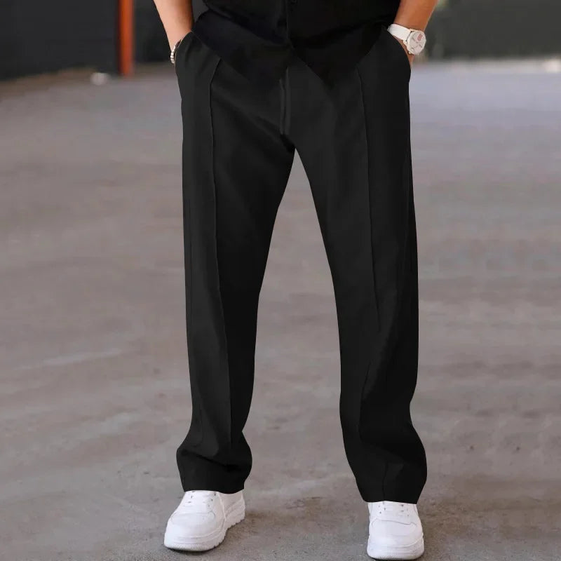 Stylish men's loose-fit formal trousers in a light grey, suitable for various business occasions.