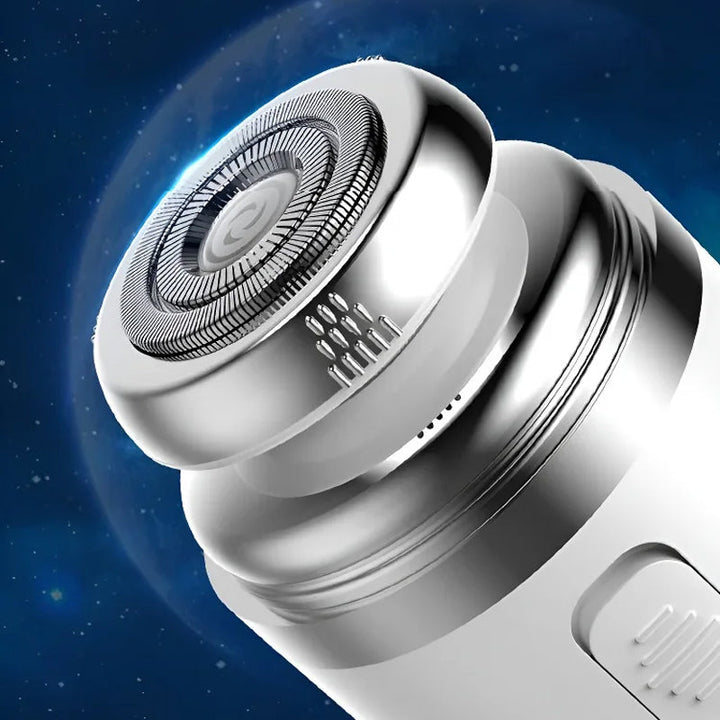 Close-up of a small electric shaver, perfect for men's travel grooming and quick touch-ups