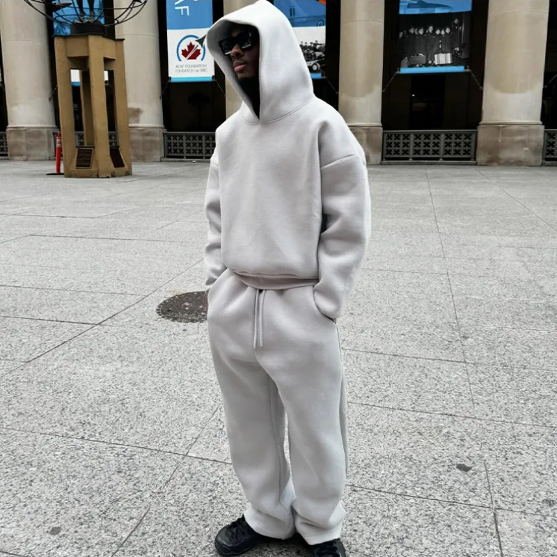 Men's minimalist hooded sweater and jogger set in black, comfortable loungewear outfit