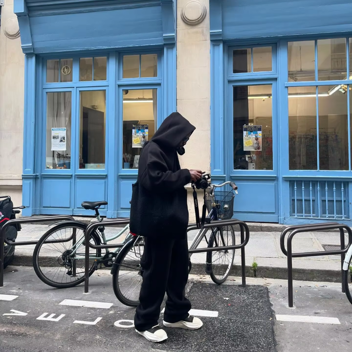 Relaxed fit men's hooded sweatsuit in a neutral tone, perfect for lounge or casual outings