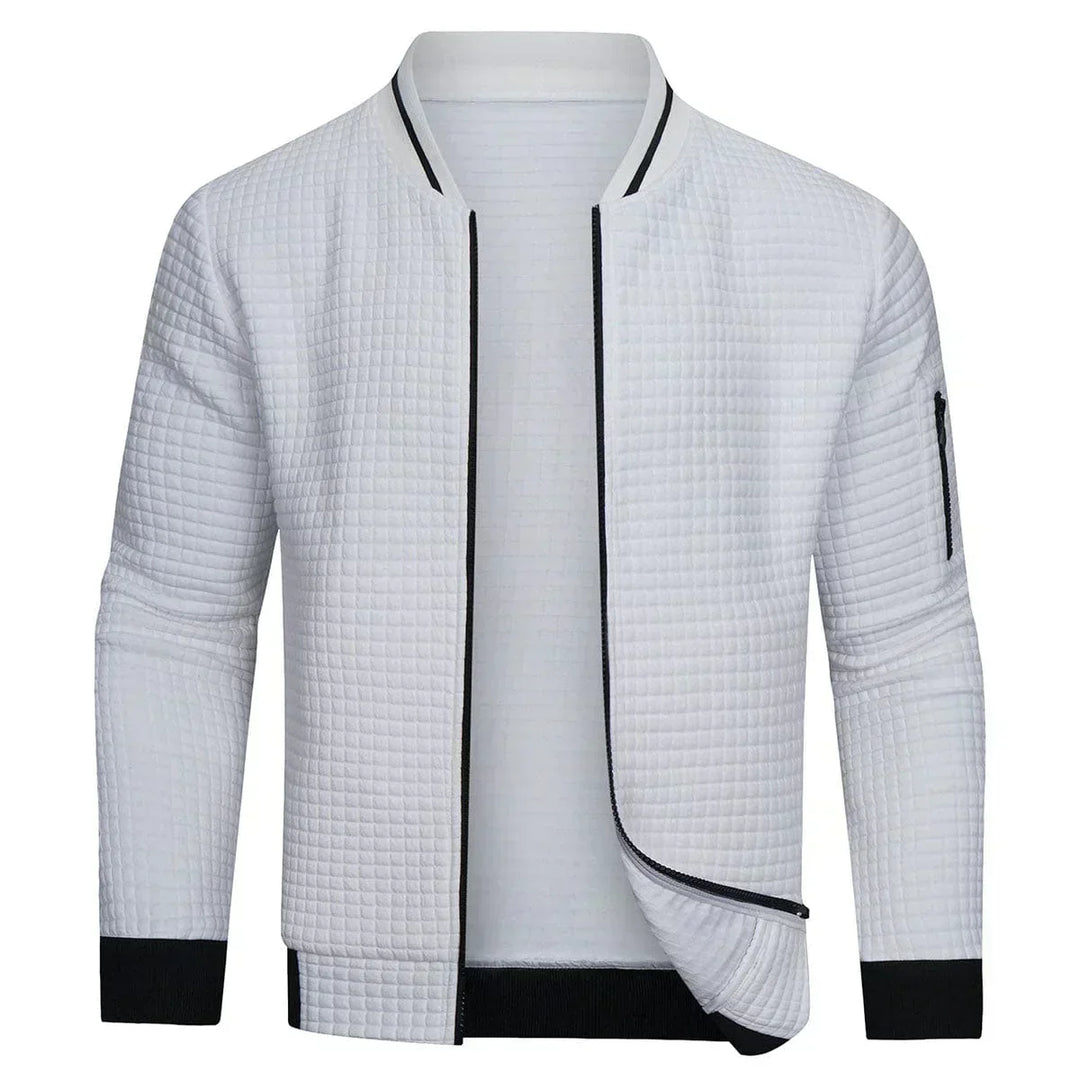 Man wearing a versatile men's full-zip textured grid cardigan with a t-shirt for effortless casual style.