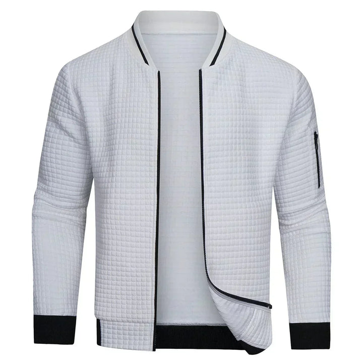 Man wearing a versatile men's full-zip textured grid cardigan with a t-shirt for effortless casual style.