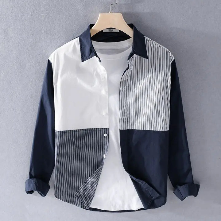 Stylish men's stripe button-down shirt with unique contrast paneling, perfect for smart casual summer wear