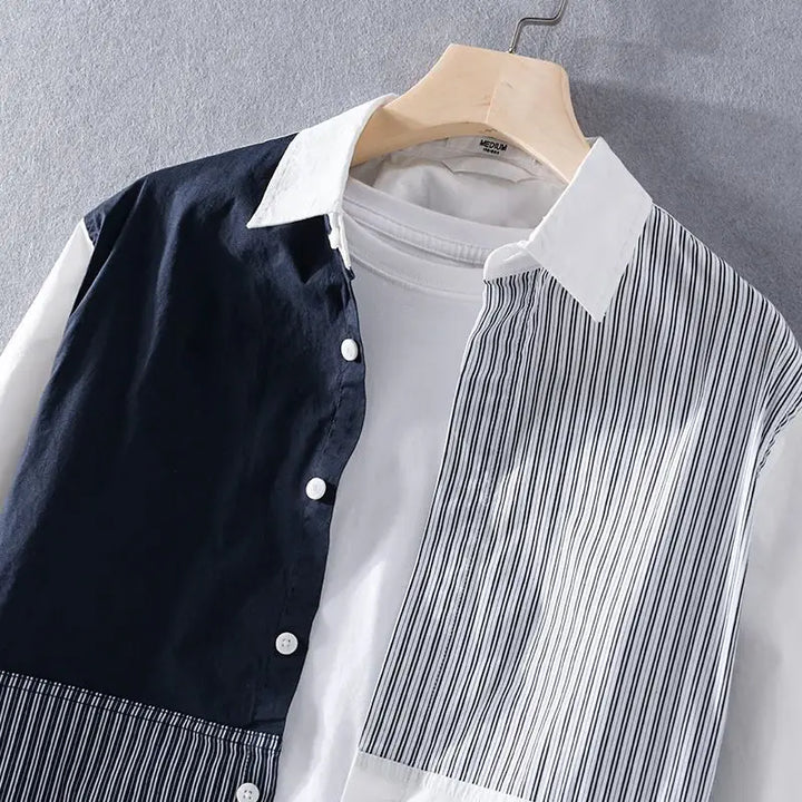 Front view of a men's modern casual shirt with a distinctive blue and white stripe contrast panel