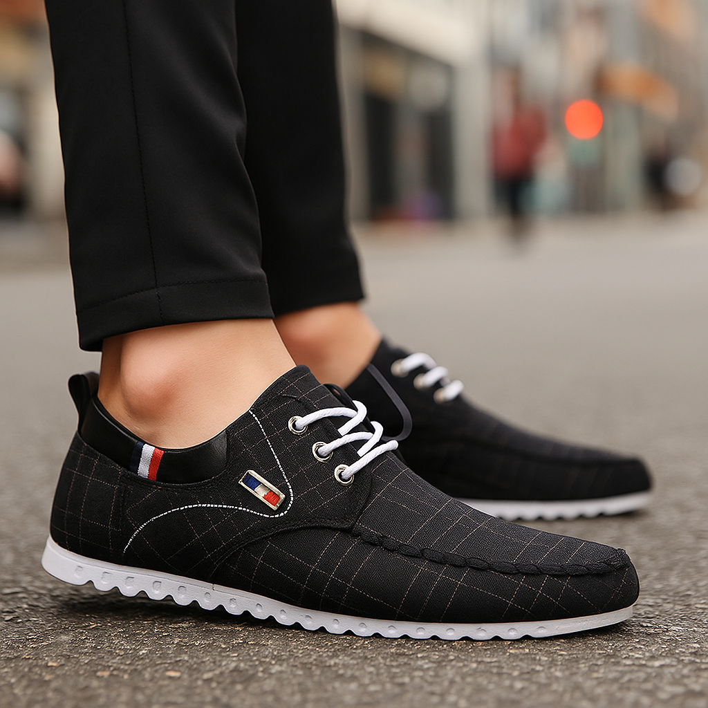 A man walking in Men's Modern Knit Comfort Sneakers, emphasizing their suitability as travel shoes.