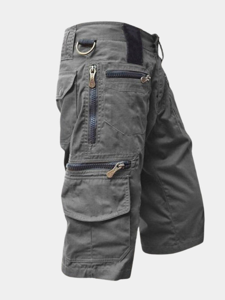 Men's multi-pocket cargo shorts, ideal for outdoor adventures & daily utility. Comfortable summer wear.
